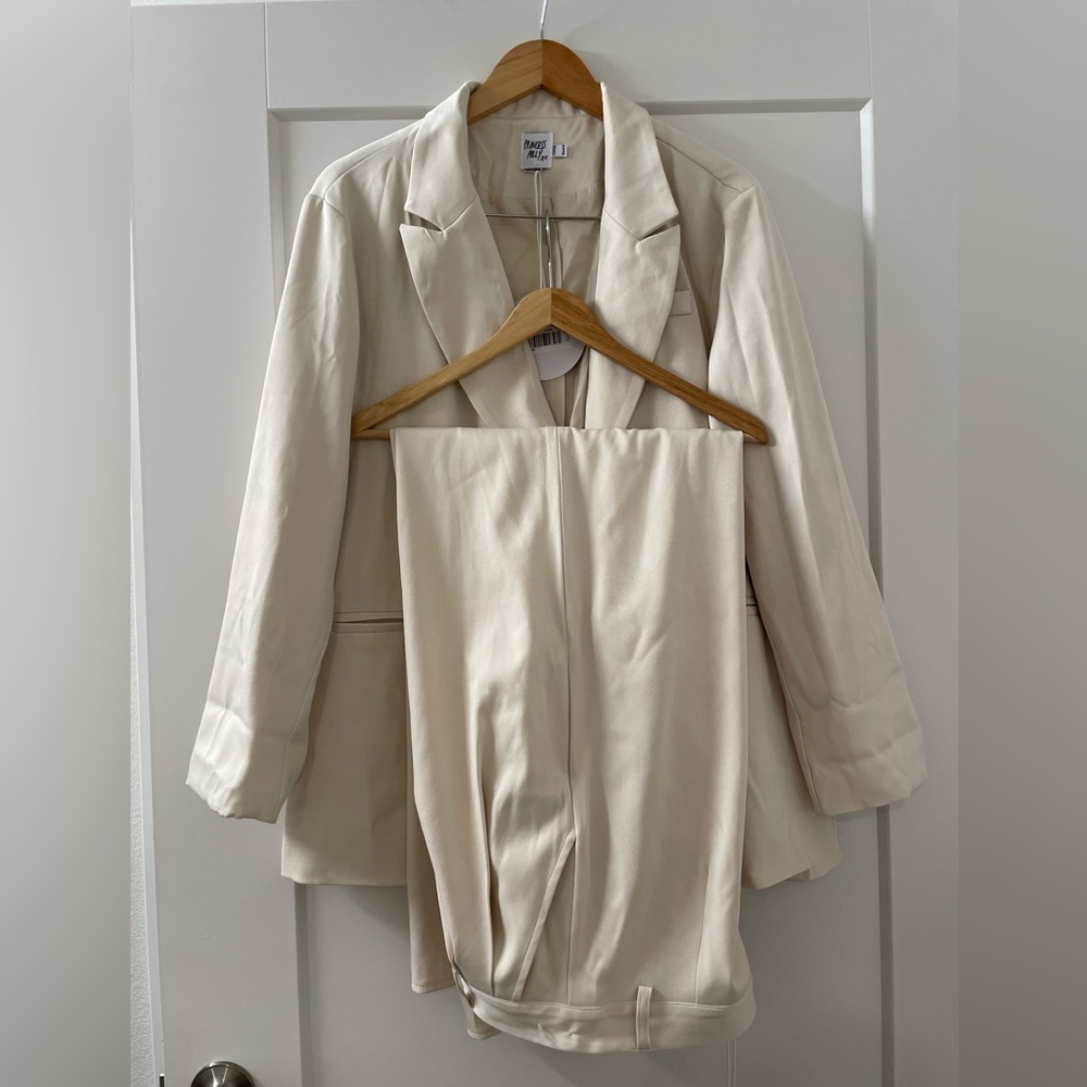 Matching blazer and pant set in cream/ivory